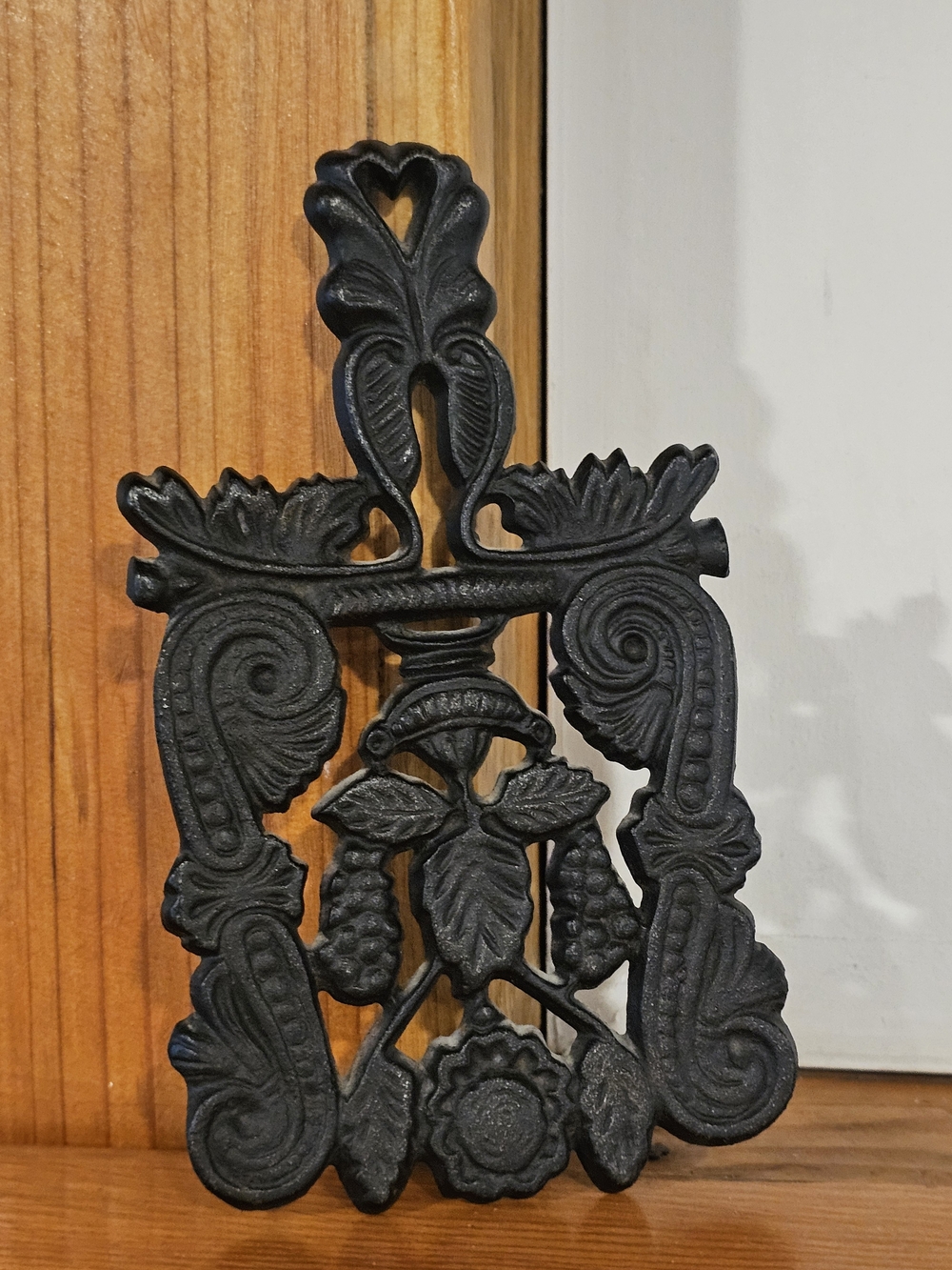 Black Decorative Cast Iron Wall Accent - Ornate Floral Design